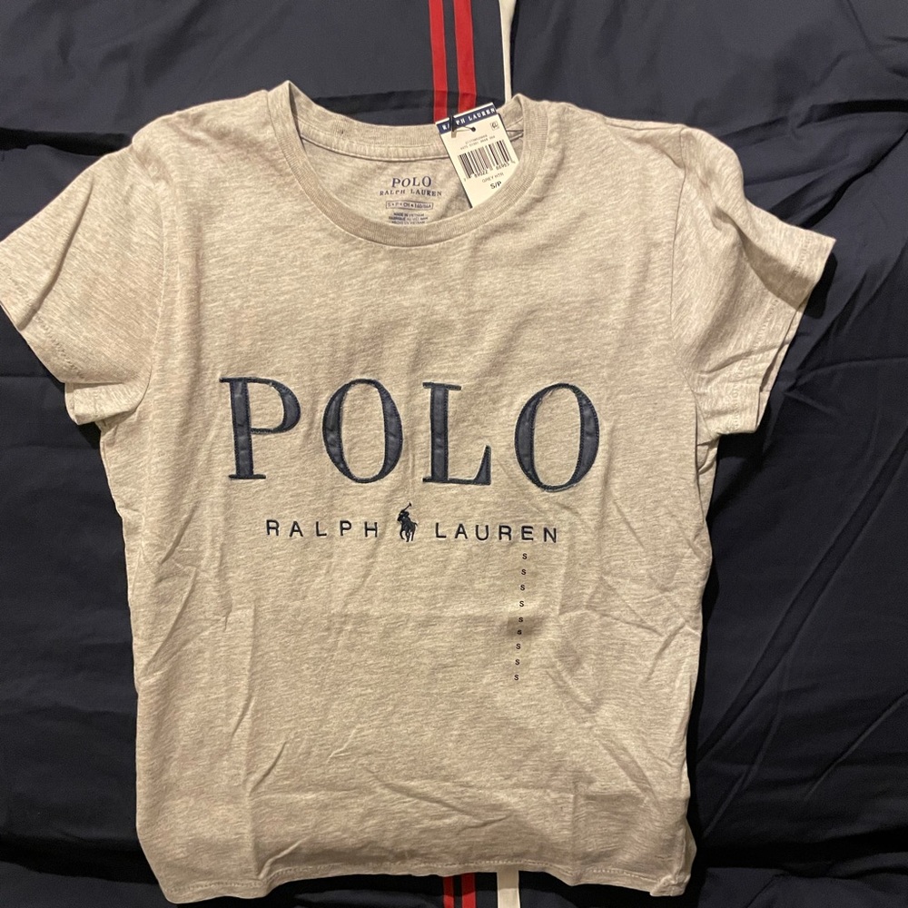 Women’s authentic grey polo Ralph Lauren shirt.